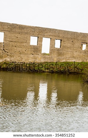 abandoned ruin next to a lake at the Golan Heights, Israel.
