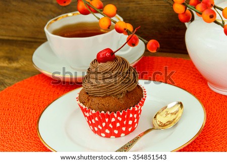 Cake with Cream, Cupcake on Wood Background. Studio Photo
