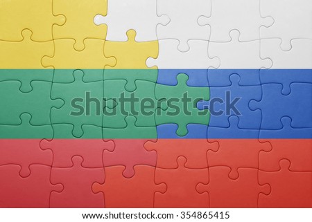 puzzle with the national flag of lithuania and russia . concept