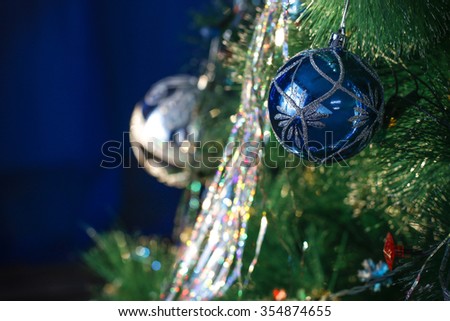 Christmas decoration on a Christmas tree. Blue background