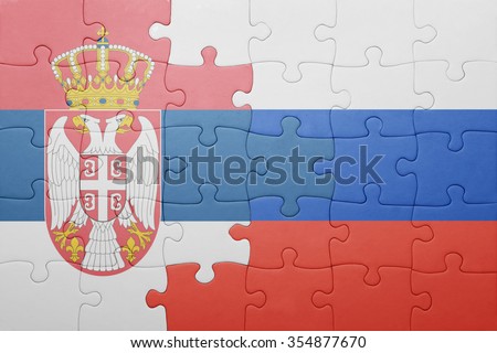 puzzle with the national flag of serbia and russia . concept
