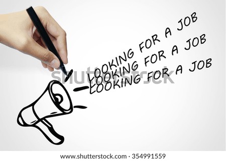 Hand writing megaphone with LOOKING FOR A JOB Announcement