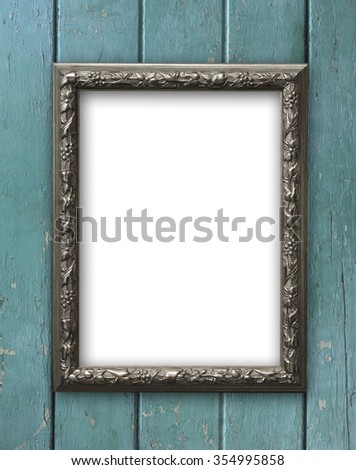 Vintage  and blank photo frame on old wooden background