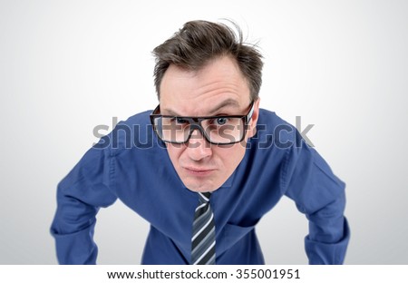 Businessman with glasses looks, concept vision