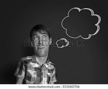 Portrait of caricature cartoon man thinking. Blackboard background