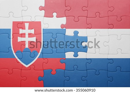 puzzle with the national flag of netherlands and slovakia . concept