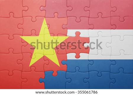 puzzle with the national flag of netherlands and vietnam . concept
