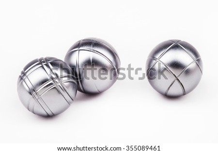 three heavy petanque balls on a white background Royalty-Free Stock Photo #355089461