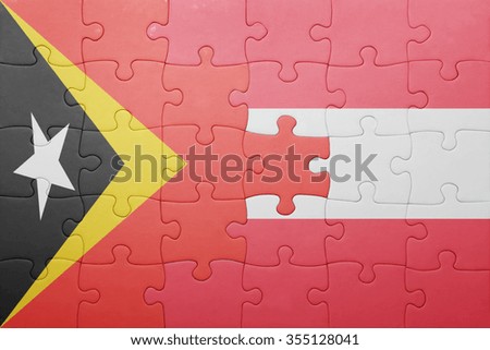puzzle with the national flag of east timor and austria . concept