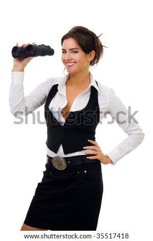 Young woman standing and looking into binocular with big smile