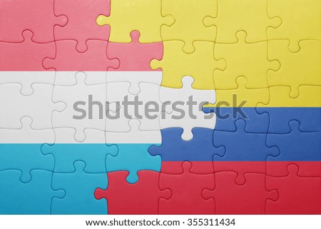 puzzle with the national flag of colombia and luxembourg . concept