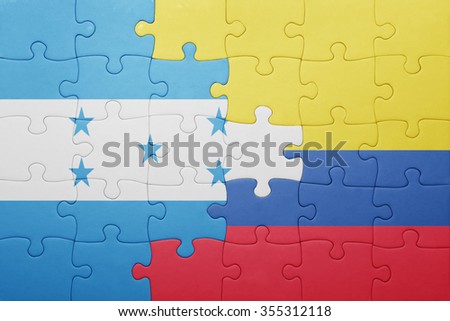 puzzle with the national flag of colombia and honduras . concept