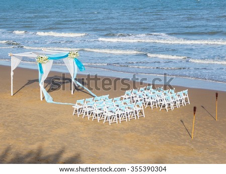wedding ceremony on the beach Royalty-Free Stock Photo #355390304