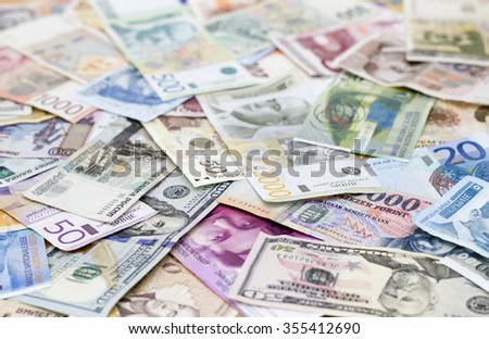 various currencies on the table Royalty-Free Stock Photo #355412690