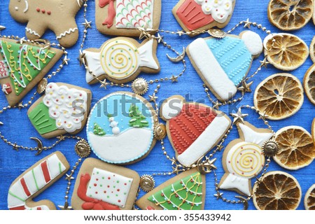 Christmas gingerbread on a wooden table.dried oranges, christmas decoration