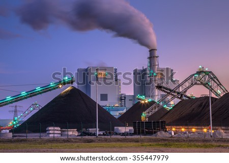 Coal power plant play a vital role in electricity generation worldwide. Altough modern plants are much more efficient than before, it is not a clean form of electricity. Royalty-Free Stock Photo #355447979