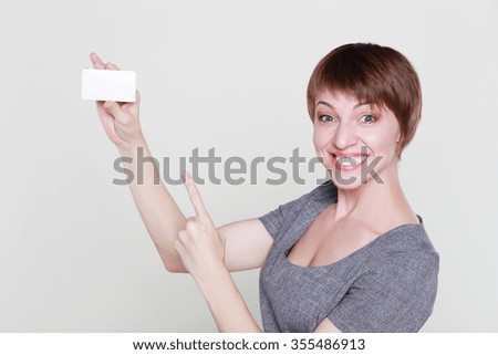 crazy woman hold credit or business card