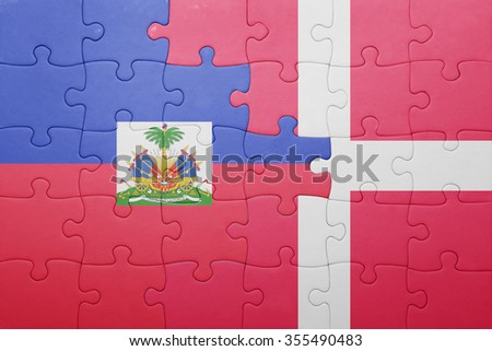 puzzle with the national flag of haiti and denmark . concept