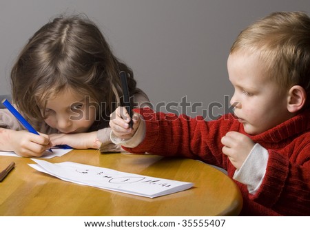 Boy and girl drawing