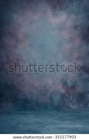 Traditional painted canvas or muslin fabric cloth studio backdrop or background, suitable for use with portraits, products and concepts. Dramatic, stormy dark purples and blues. Royalty-Free Stock Photo #355577903
