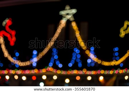 Lights blurred bokeh background from christmas night at Tharee sakon nakhon,Thailand