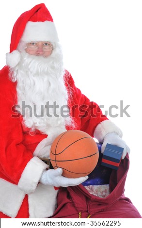 Santa Claus Holding Basketball and his Bag of Toys isolated on white