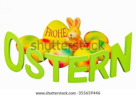 Easter Bunny, Easter eggs and even painted lettering Easter against white background.