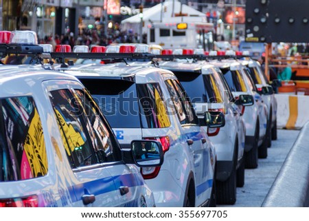 NYPD police cars at Time Square Royalty-Free Stock Photo #355697705