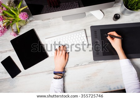 Woman working on modern technology 