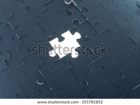 Grey puzzle background with empty space, close up view