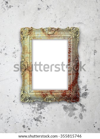 Close-up of one baroque picture frame on weathered wall background