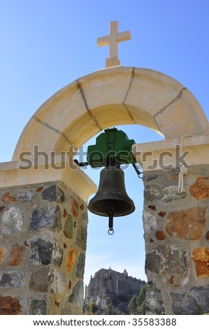 Bell and  Stavrovouni Monastery on the background