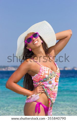 Young woman in bikini relax on the beach