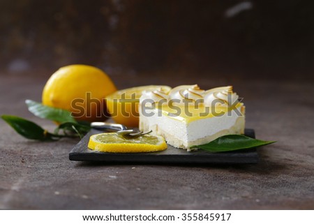 homemade baked lemon tart cake with meringue cream