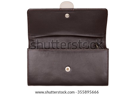 Close-up view of brown opened female purse isolated on white background