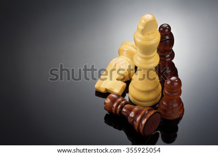chess figures on black  background