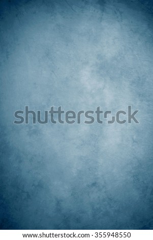Painted canvas or muslin fabric cloth studio backdrop or background, suitable for use with portraits, products and concepts. Various shades of blue.