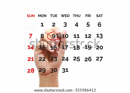 Red circle. Businessman mark on the calendar at 9