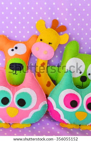 Crafts out of felt - felt handmade toy owl, bear, cat, giraffe 