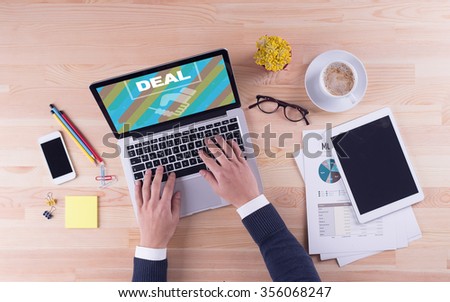 Businessman is working on desk - DEAL