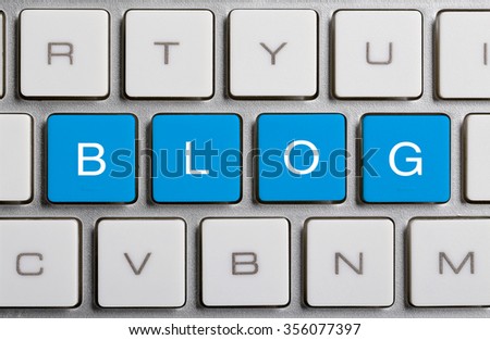 Blog text on the colorful buttons of the keyboard.