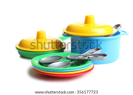Children's toy dishes, isolated on a white background. Royalty-Free Stock Photo #356177723