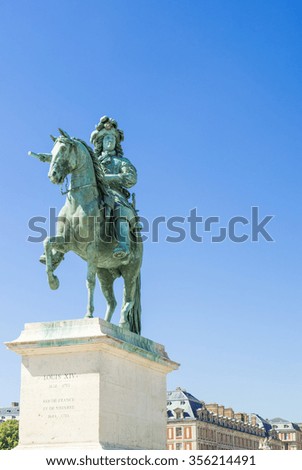 Monument by Louis XIV in front of Versailles Palace. Palace Versailles was a royal chateau. It was added to UNESCO list of World Heritage Sites. France