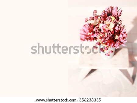 Beautiful bouquet in a tin bucket,soft focus and high-key process.Vintage color.