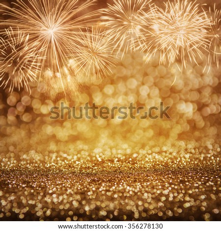 Defocused fireworks and bokeh at New Year and copy space. Abstract background holiday. Royalty-Free Stock Photo #356278130