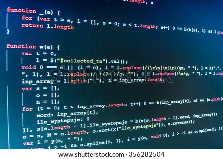 Software developer programming code on computer. Abstract computer script source code. Shallow depth of field, selective focus effect. All code and text written and created entirely by myself.