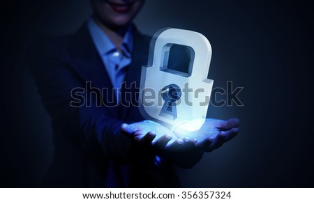 Close up of businesswoman hand holding digital icon in palm