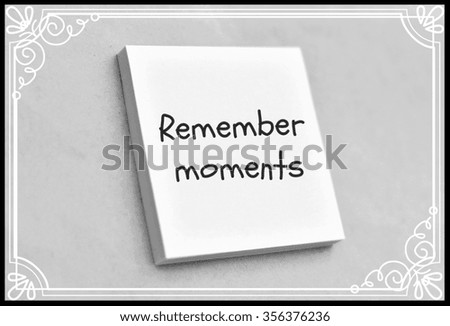 Text remember moments on the short note texture background