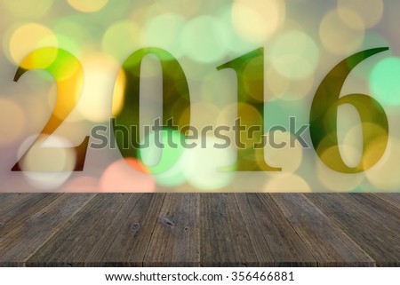 Wood terrace and Abstract bokeh background of Christmas tree decoration for merry christmas Xmas and happy new year 2016