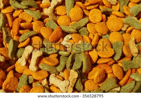 pile of dog food in various random shapes and colors